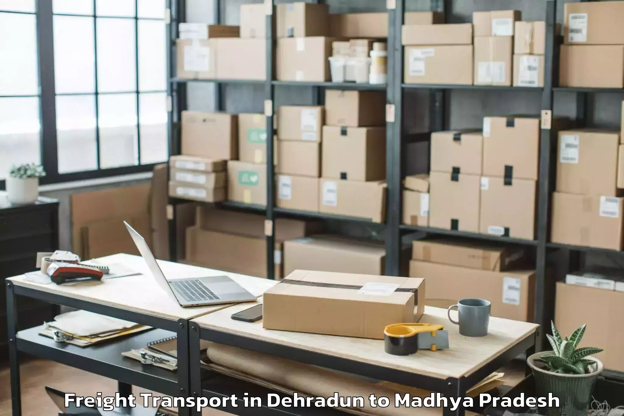 Top Dehradun to Dewas Freight Transport Available